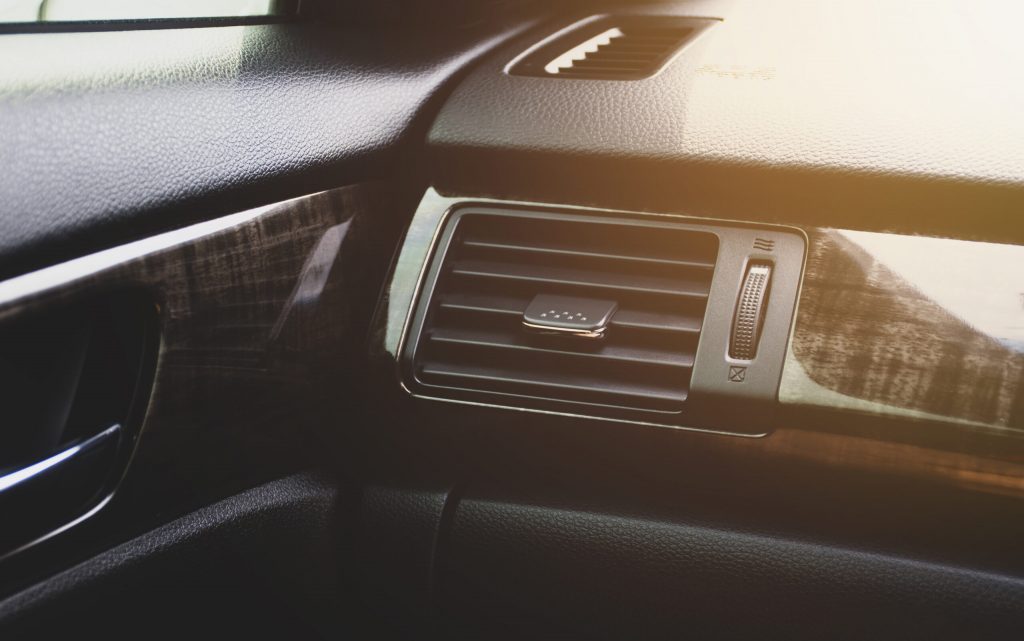 Air condition vent for adjust airflow in a passenger room of ca Air condition vent for adjust airflow in a passenger room of car with a square shape, automotive part concept.